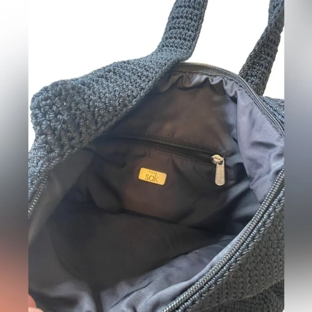 The SAK black woven crochet knit shoulder bag purse excellent condition